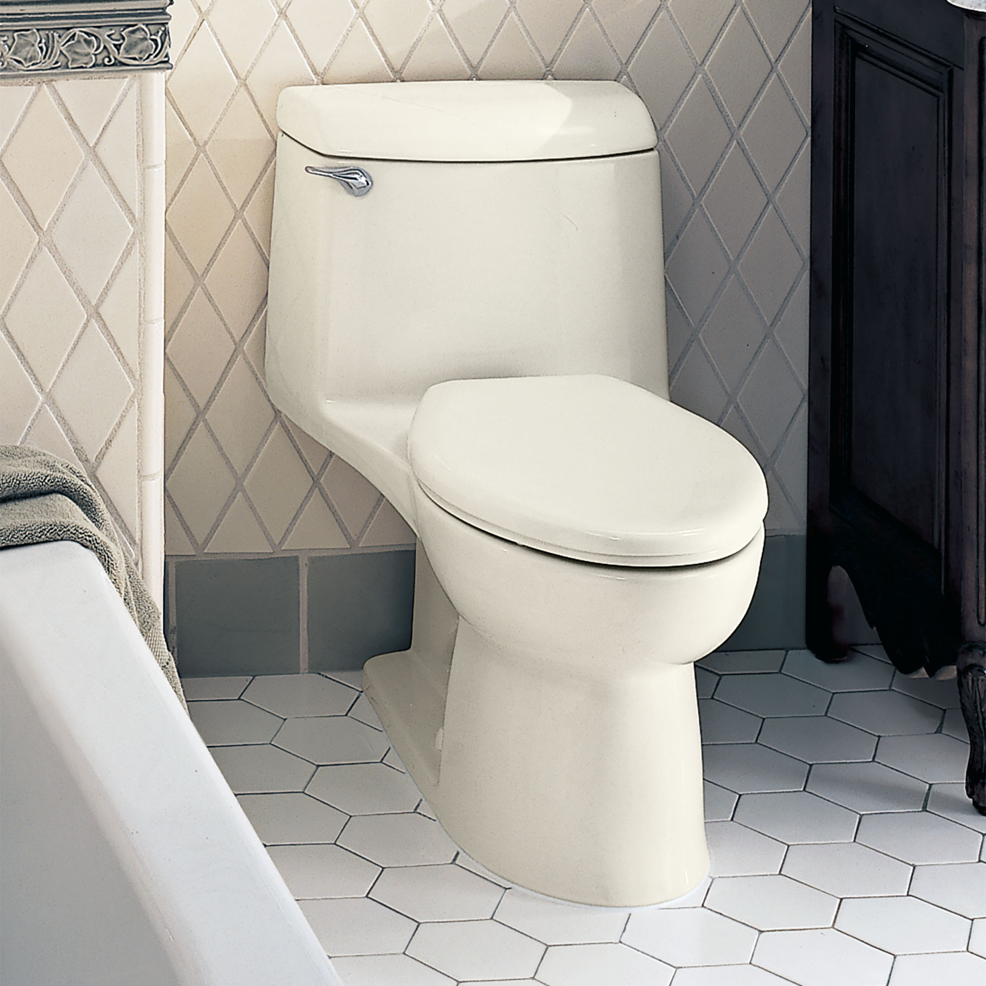 Champion® 4 One-Piece 1.6 gpf/6.0 Lpf Chair Height Elongated Toilet With Seat