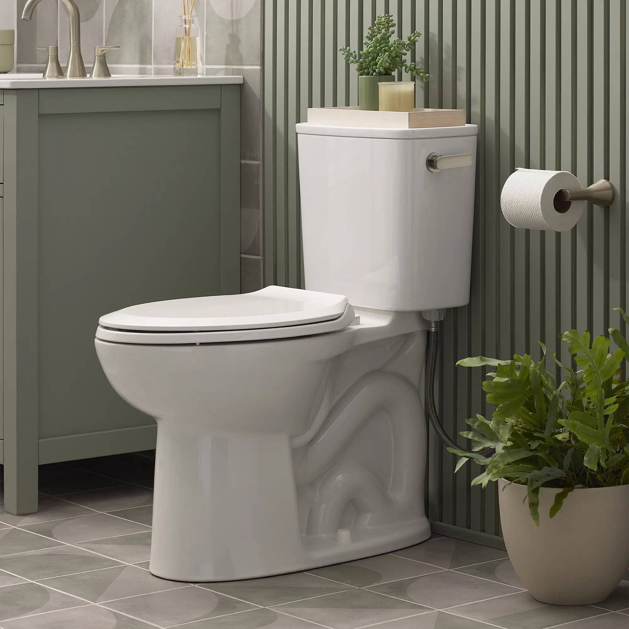 Aspirations EcoStrength Two-Piece 0.80 gpf/3.0 Lpf Chair Height Elongated Right-Hand Trip Lever Toilet Less Seat