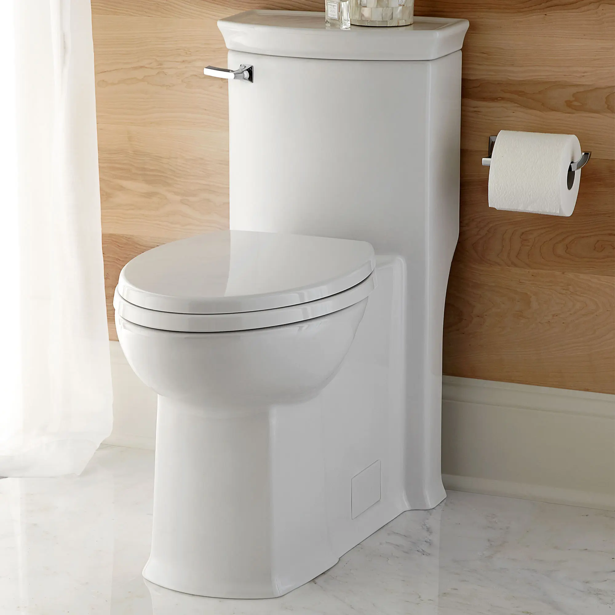 Wyatt® One-Piece Chair Height Left-Hand Trip Lever Elongated Toilet with Seat