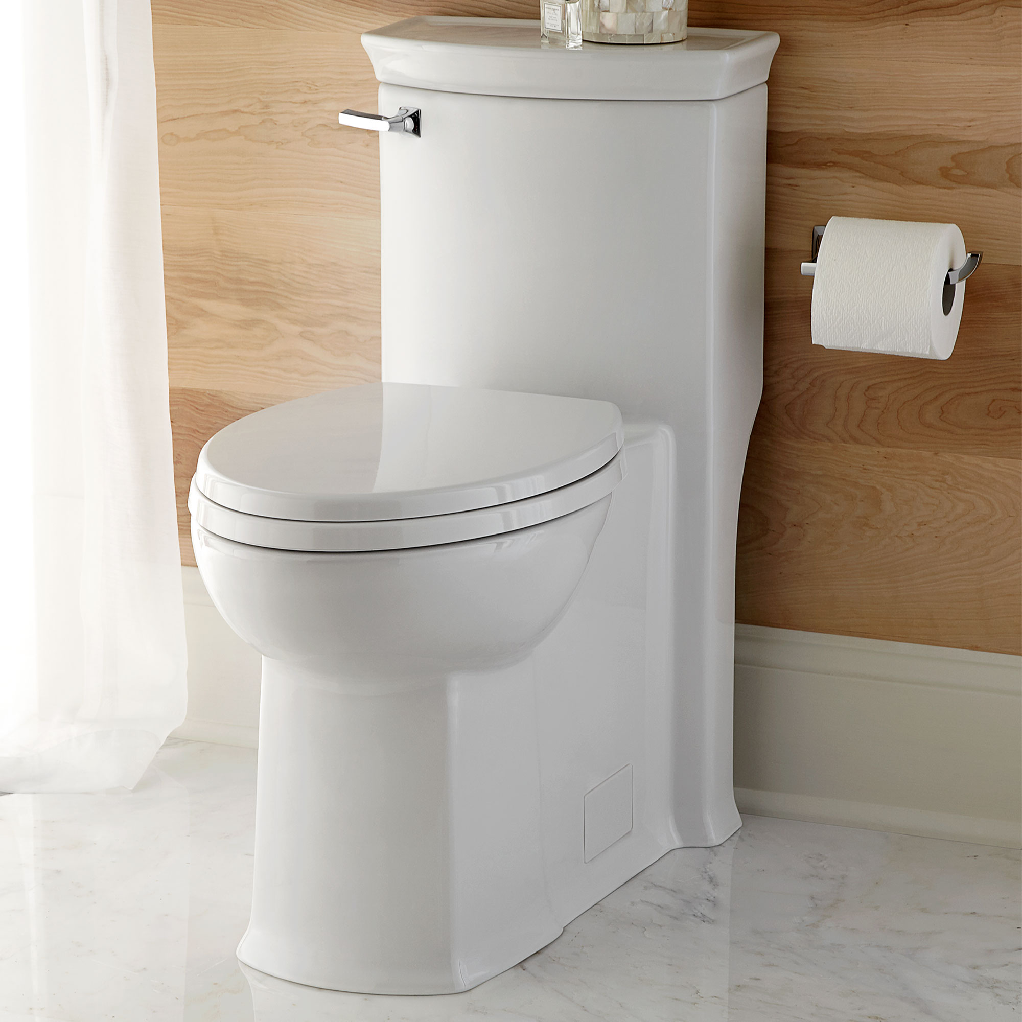 Wyatt® One-Piece Chair Height Left-Hand Trip Lever Elongated Toilet with Seat