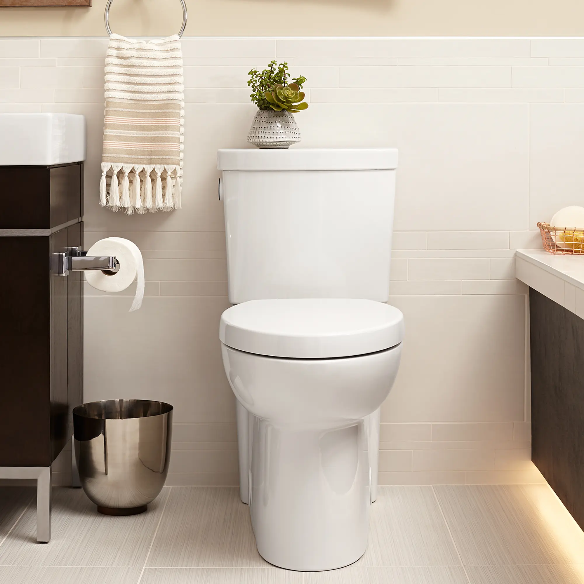 Studio® Activate® Two-Piece Concealed Trapway 1.28 gpf/4.8 Lpf Chair Height Elongated Toilet