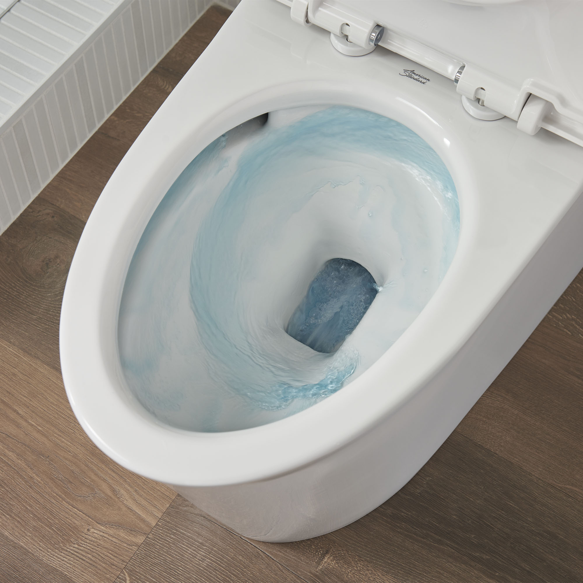 Studio™ S One-Piece 1.0 gpf/3.8 Lpf Chair Height Elongated Toilet With Seat