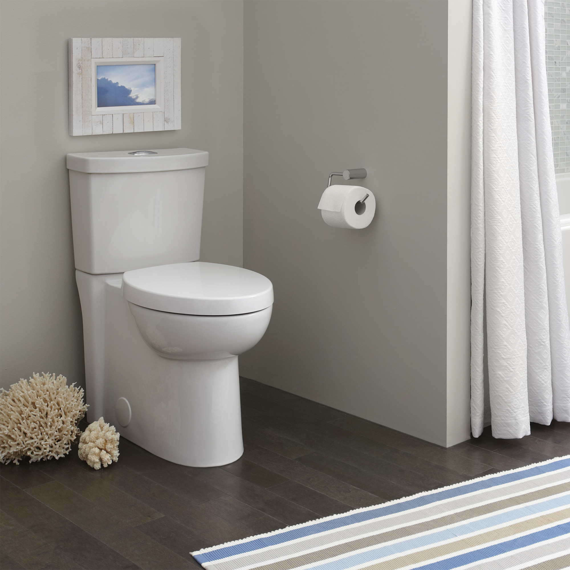 Studio™ Skirted Two-Piece Dual Flush 1.6 gpf/6.0 Lpf and 1.1 gpf/4.2 Lpf Chair Height Elongated Toilet With Seat