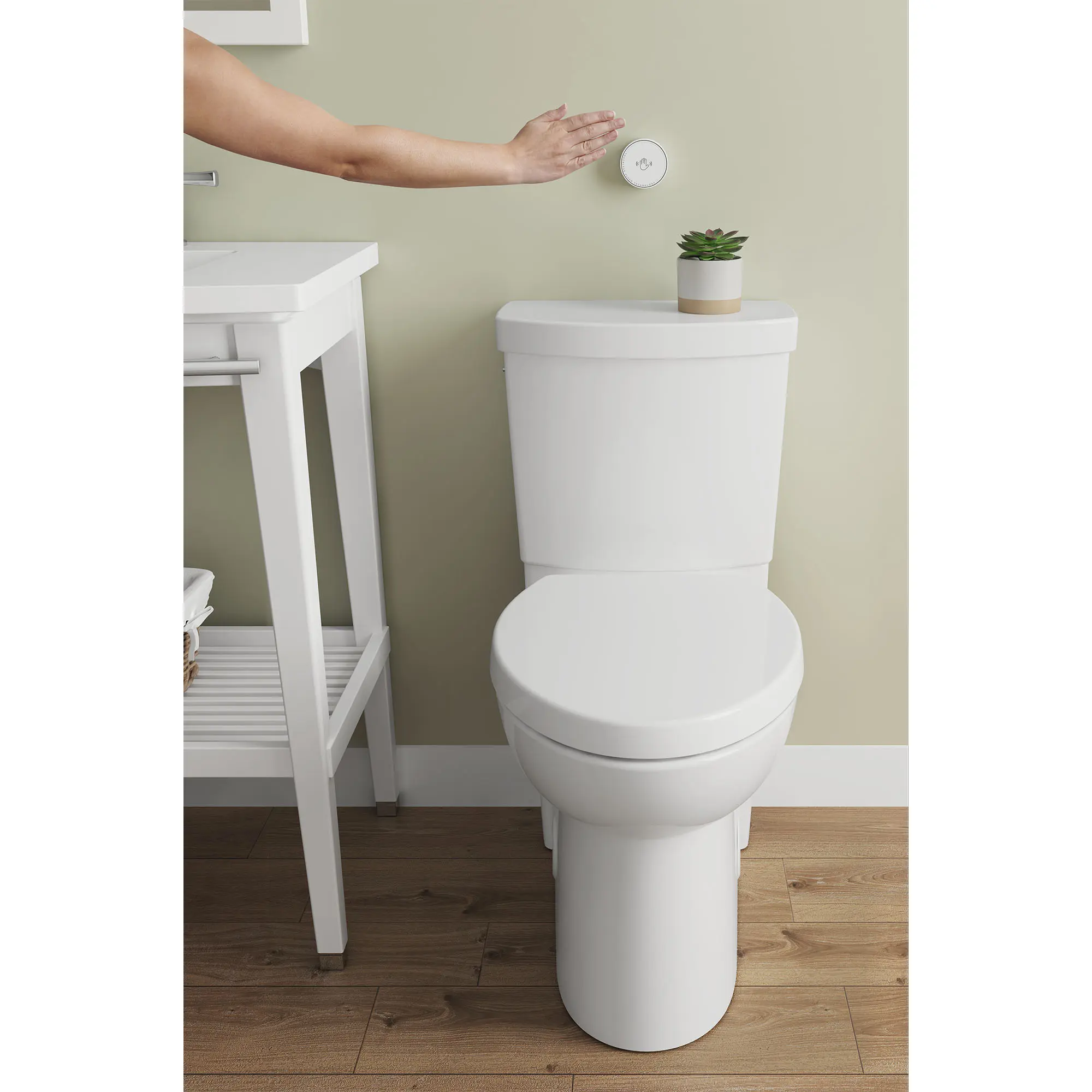 Studio Touchless Skirted Two-Piece 1.28 gpf/4.8 Lpf Chair Height Elongated Toilet with Seat